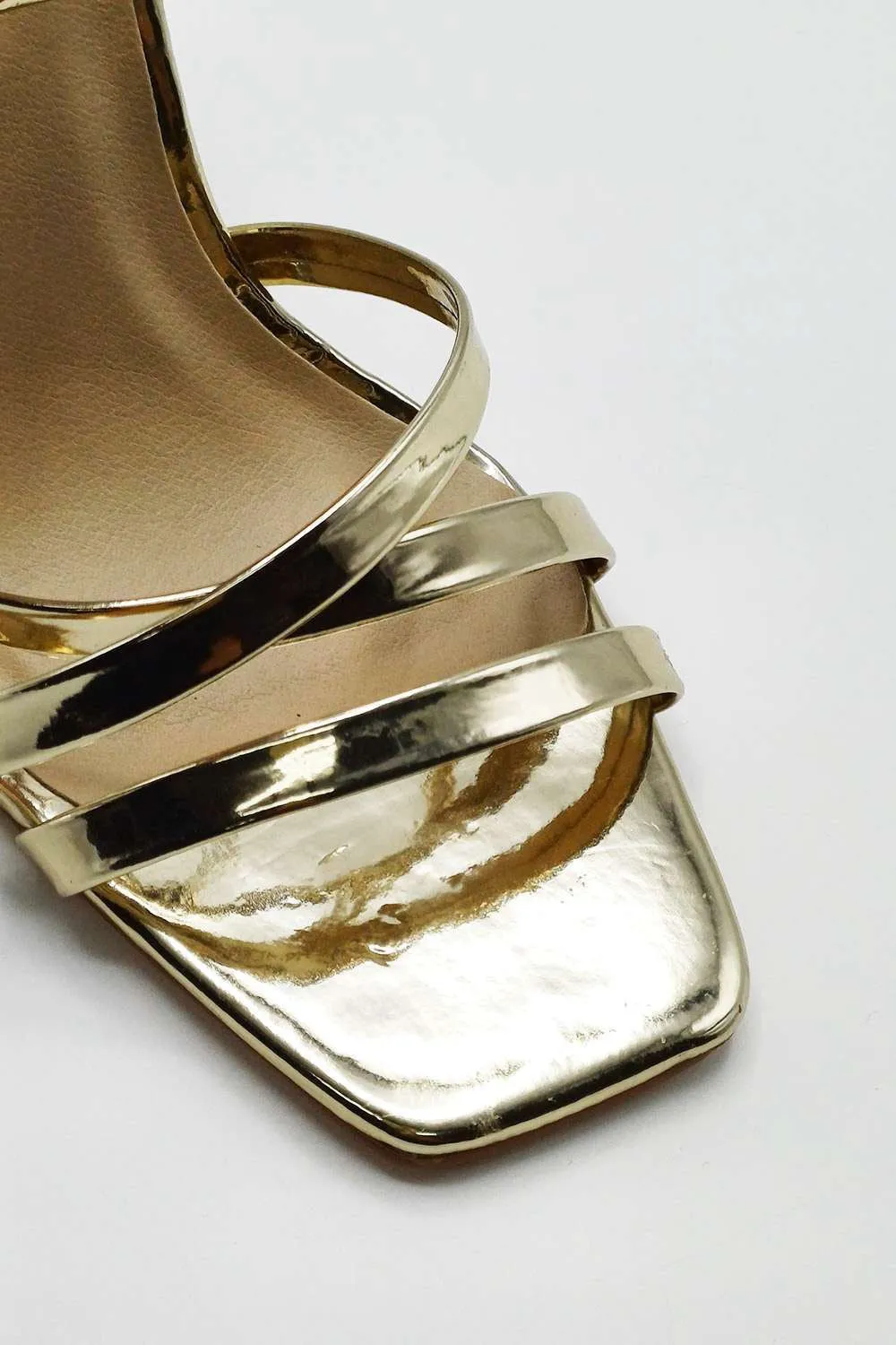Reeba Strappy High Heel Sandals in Gold